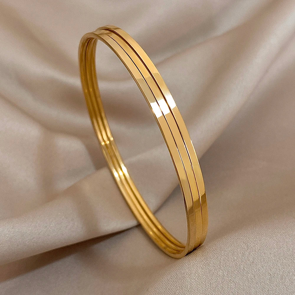 Pulsera de acero inoxidable chapada en oro brillante de 18 quilates (3 unidades) - Diseño minimalista